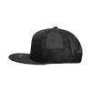 A black 7 panel high profile structured trucker cap featuring a mesh back and a curved brim.