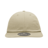 A relaxed flat bill cap in a light beige colour with a round logo on the front.