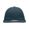 A relaxed flat bill cap in dark blue with a logo on the front.
