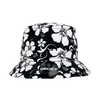 A structured floral fisherman's hat featuring a black and white floral pattern and a branded badge.