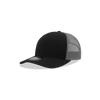 A black trucker cap with a mid-profile design and a grey mesh back, featuring a logo on the front.