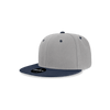 A snapback cap featuring a grey body and navy blue peak. It has a structured, high-profile design and a logo.