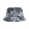A tie dye bucket hat featuring shades of blue and grey with a wide brim and an inner band.