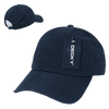 A navy blue 6 panel low profile relaxed vintage dad hat with a tag and a logo.
