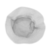 A white bucket hat with a textured exterior and a smooth interior. It features an inner lining and has a branding logo.