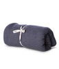 A rolled blue stadium blanket tied with a string, showcasing a soft and warm texture.