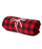 A rolled red and black checkered blanket tied with a white cord. It features a logo on the fabric.