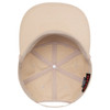 A beige 5 panel pro style baseball cap featuring a textured pattern and a logo on the inner band.