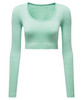 A ribbed, seamless crop top in a light mint green colour, featuring long sleeves and a scoop neckline.
