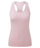 A pink sleeveless sport vest with a seamless design, featuring a racerback style and a small logo.