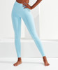 Light blue seamless leggings with a fitted design, featuring a side pocket and a subtle logo.