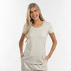 A scoop neck shirt in a light beige colour, modelled by a smiling woman with long hair. The shirt has short sleeves.