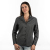A woman wearing a black and white checked Stretched Poplin Shirt, featuring a button-up design and a collar.