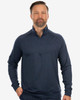 A navy soft jersey quarter zip top with a zippered collar and long sleeves, featuring a logo on the chest.