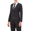 A black waist jacket is presented on a model, paired with a white shirt and a black tie. The jacket has a branded logo.