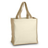 A tote bag with natural canvas sides and jute handles, featuring a plain design and a sturdy structure.