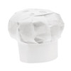 A white chef hat made of paper, featuring decorative holes on top, presented upright.