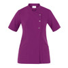 A purple tunic with short sleeves, featuring a stylish front closure and two pockets. It has a logo on the label.