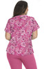 A floral print top in shades of pink, featuring short sleeves and a relaxed fit, with a logo on the back.