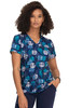 A patterned top featuring blue hues and a graphic design, with short sleeves and a V-neckline.