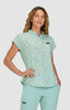 A light green top with a collar, featuring short sleeves and a subtle print, worn by a model.