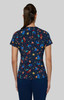 A fitted top featuring a colourful space print on a navy background, with a round neckline and short sleeves.