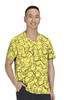 A bright yellow top featuring a playful print with various shapes and lines, worn by a man. It has a logo.