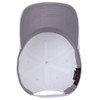 A white 5 panel mid-profile baseball cap with a grey underside and a logo on the interior.