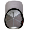 A grey 5 panel mid-profile baseball cap with an inner view displaying fitted lining and a logo.