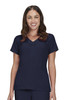 A scrub top in navy blue, featuring short sleeves and a v-neck design, worn by a woman smiling.