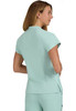 A short-sleeved, mint green top with a fitted design and a back slit, featuring branding details.