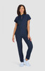 A uniform set featuring a navy top with a zip and matching navy pants, suitable for professional wear.