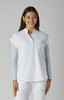 A white top with a relaxed fit and short sleeves, featuring a pocket and a logo.