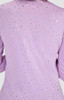 A lilac Tessa Tee with a sprinkle of shiny embellishments scattered across the fabric. The tee features a logo.