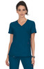 A teal scrub top with a v-neck, featuring a logo and pink accents, worn by a model.
