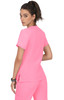 A bright pink top with a simple design, featuring short sleeves and a slight side split.