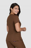 A brown top with short sleeves, featuring a logo on the side, designed for a stylish and comfortable fit.