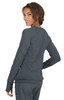 A smiling woman in a grey Clarity Jacket, viewed from the back, showcasing its slim fit and stylish design.