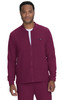 A maroon jacket with a zipped front and a logo, worn by a smiling model.