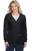 A woman wearing a black Clarissa sweater with a V-neck, buttons, and pockets. The sweater has a soft texture.