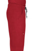 A pair of red cargo pants with pockets and an elastic waistband is displayed in profile view.