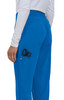 Blue scrubs with a pocket visible, holding a pair of black scissors. The model is facing away from the camera.