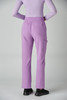 A pair of lavender boot cut pants featuring an elastic waistband and pockets, viewed from the back.