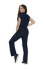 A navy blue Anja Jumpsuit worn by a model, featuring a fitted design and a pocket, displayed from the side.