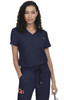 A navy scrubs top featuring a V-neck design and a chest pocket, accompanied by matching pants. It has a logo.