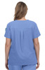 A blue medical scrubs top with a relaxed fit and a rear pleat, featuring a logo on the sleeve.