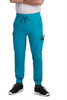 A pair of teal jogger pants with pockets, featuring a drawstring waist, worn with black shoes.