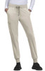 A pair of light beige jogger pants with a drawstring waistband and side pockets, paired with black footwear.