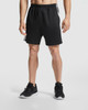 Black sports shorts with an elastic waistband, designed for active wear. Features branding on the side.