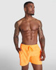 Bright orange Aqua Swimming Shorts with an elastic waistband and drawstring, featuring a logo on the front.